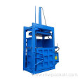 Vertical hydraulic baling press baler for clothes